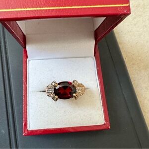 10 K genuine, garnet and diamond ring